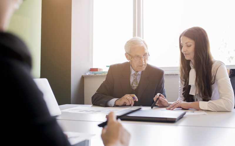 young-businesswoman-having-discussion-office